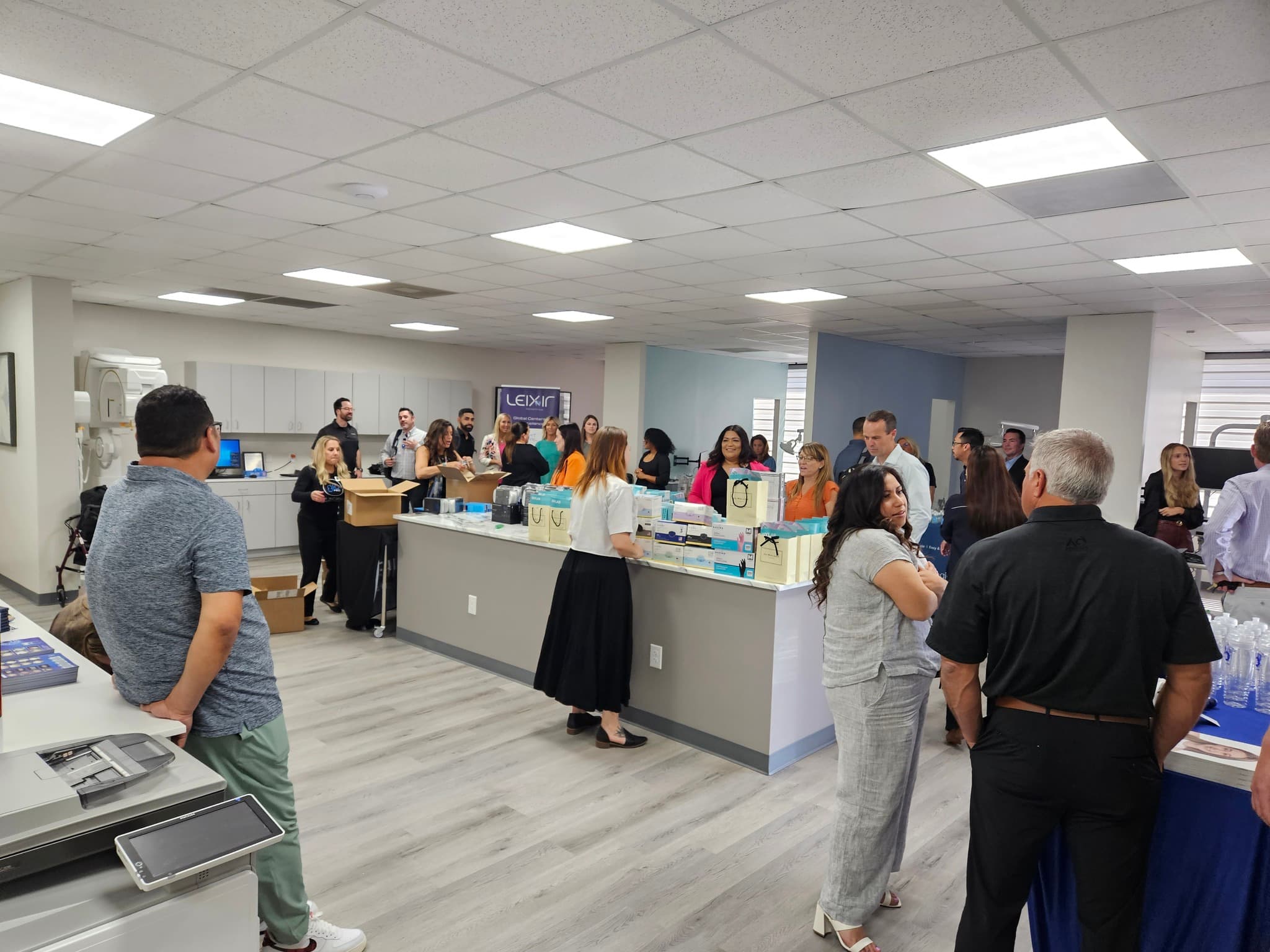 Central multipurpose area hosting a professional dental education event